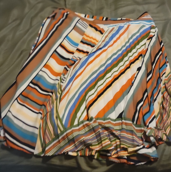 Multi color stripped knee length skirt with buttons on the inside and a string. - Picture 3 of 4